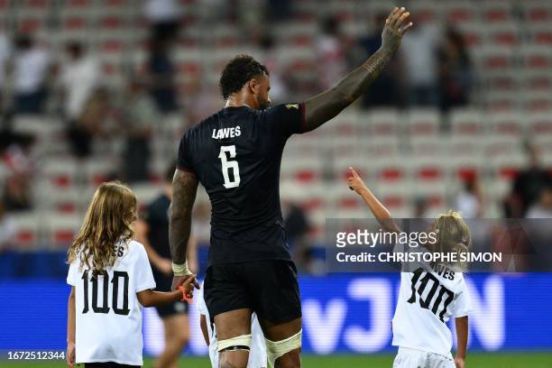 England's blindside flanker and captain Courtney Lawes celebrates the victory after the France 2023 Rugby World Cup Pool D match between England and...