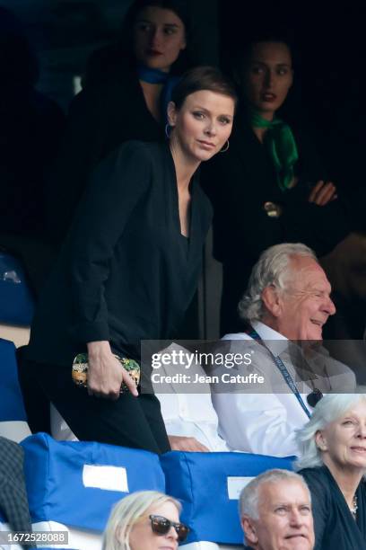 Princess Charlene of Monaco, World Rugby Chairman Sir Bill Beaumont attend the Rugby World Cup France 2023 match between South Africa and Scotland at...