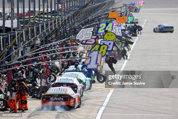 Ross Chastain, driver of the Kubota Chevrolet, exits pit road during the NASCAR Cup Series Hollywood Casino 400 at Kansas Speedway on September 10,...