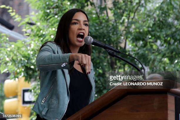 Democratic Representative from New York Alexandria Ocasio-Cortez speaks at the end of the rally to end fossil fuels ahead of the 78th United Nations...