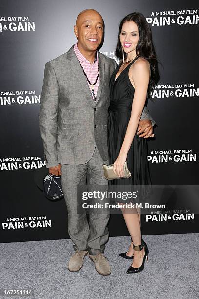Producer Russell Simmons and Hana Nitsche attend the premiere of Paramount Pictures' "Pain & Gain" at the TCL Chinese Theatre on April 22, 2013 in...