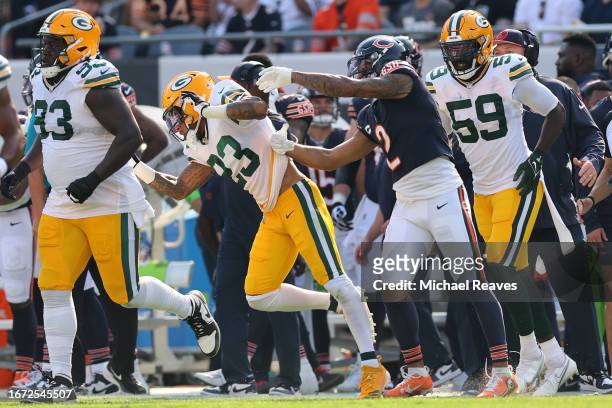 Moore of the Chicago Bears shoves Jaire Alexander of the Green Bay Packers after the whistle during the first half at Soldier Field on September 10,...