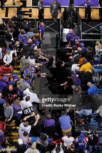 Head Coach Keith Smart of the Sacramento Kings greets fans while exiting after the game against the Los Angeles Clippers on April 17, 2013 at Sleep...