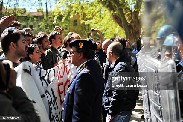 Students clash with the police during a demonstration at Scuola Superiore Sant'Anna on April 23, 2013 in Pisa, Italy. Clashes between the police and...