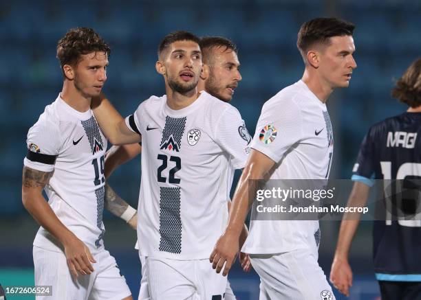 Adam Cerin of Slovenia celebrates with teammates prior tro his goal being disallowed during the UEFA EURO 2024 European qualifier match between San...