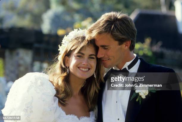 Portrait of Sports Illustrated via Getty Images swimsuit model Kathy Ireland with husband Dr. Greg Olsen on wedding day. San Diego, CA 8/21/1988...