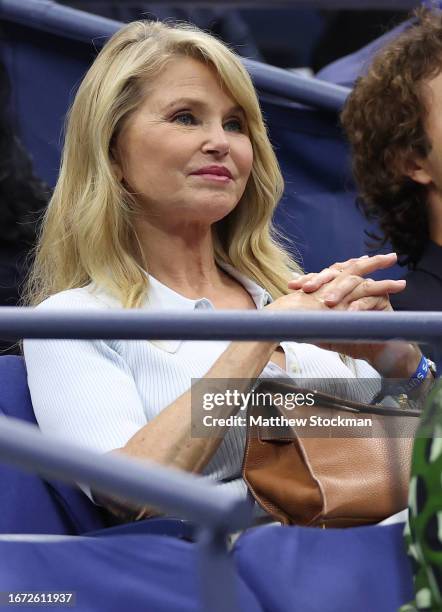 American model Christie Brinkley looks on during the Men's Singles Final match between Novak Djokovic of Serbia and Daniil Medvedev of Russia on Day...