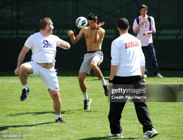 Novak Djokovic plays soccer at the BNP Paribas Open in Indian Wells. He persuaded the female tennis player Victoria Azarenka's boyfriend Stefan...