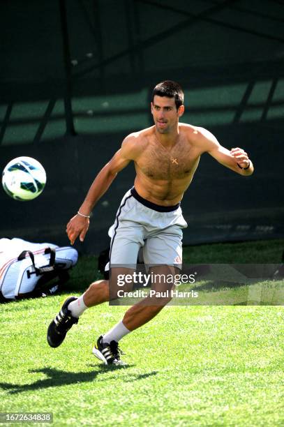 Novak Djokovic plays soccer at the BNP Paribas Open in Indian Wells. He persuaded the female tennis player Victoria Azarenka's boyfriend Stefan...