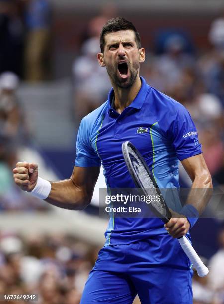 Novak Djokovic of Serbia celebrates after a point against Daniil Medvedev of Russia during their Men's Singles Final match on Day Fourteen of the...