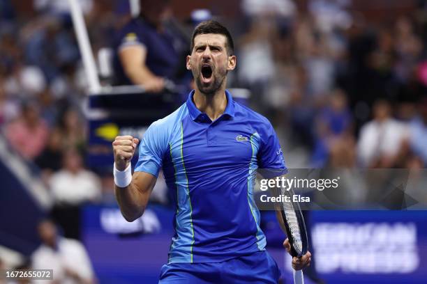 Novak Djokovic of Serbia celebrates after a point against Daniil Medvedev of Russia during their Men's Singles Final match on Day Fourteen of the...