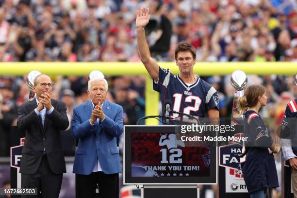 New England Patirots President Jonathan Kraft, New England Patriots owner Robert Kraft clap as former New England Patriots quarterback Tom Brady...