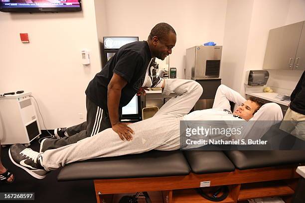 Kris Humphries of the Brooklyn Nets stretches before the game against the Chicago Bulls in Game Two of the Eastern Conference Quarterfinals during...
