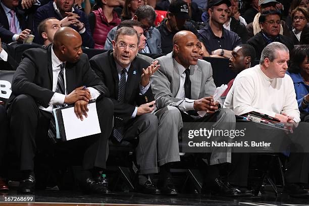 Popeye Jones, P.J. Carlesimo and Mario Elie of the Brooklyn Nets on the bench during the game against the Chicago Bulls in Game Two of the Eastern...