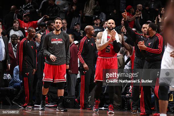 The Chicago Bulls celebrate during the game against the Brooklyn Nets in Game Two of the Eastern Conference Quarterfinals during the 2013 NBA...