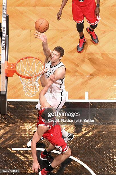 Brook Lopez of the Brooklyn Nets shoots against Joakim Noah of the Chicago Bulls in Game Two of the Eastern Conference Quarterfinals during the 2013...