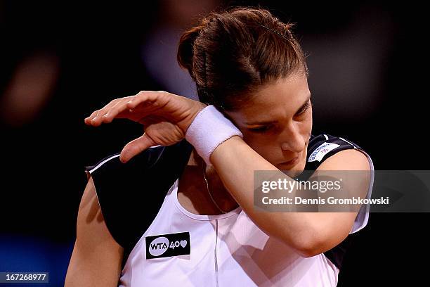 Andrea Petkovic of Germany reacts during her match against Ana Ivanovic of Serbia during Day 2 of the Porsche Tennis Grand Prix at Porsche-Arena on...