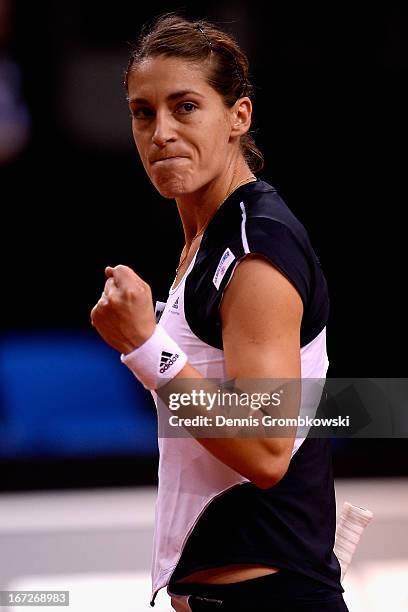 Andrea Petkovic of Germany reacts during her match against Ana Ivanovic of Serbia during Day 2 of the Porsche Tennis Grand Prix at Porsche-Arena on...