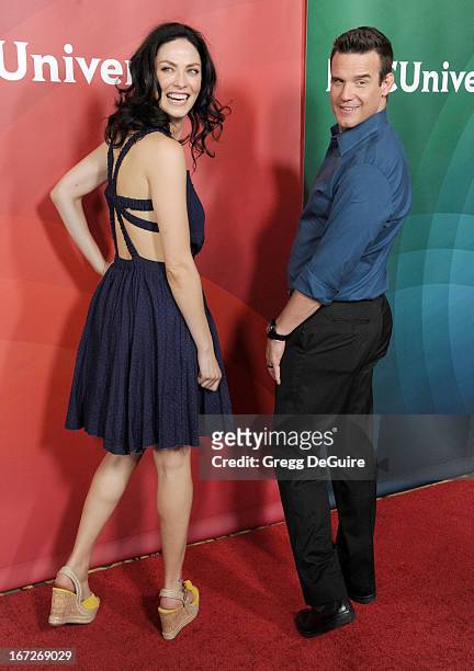 Actors Joanne Kelly and Eddie McClintock arrive at the 2013 NBC Summer Press Day at The Langham Huntington Hotel and Spa on April 22, 2013 in...