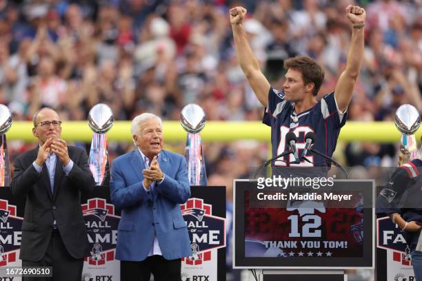 New England Patriots President Jonathan Kraft, New England Patriots owner Robert Kraft clap as former New England Patriots quarterback Tom Brady...