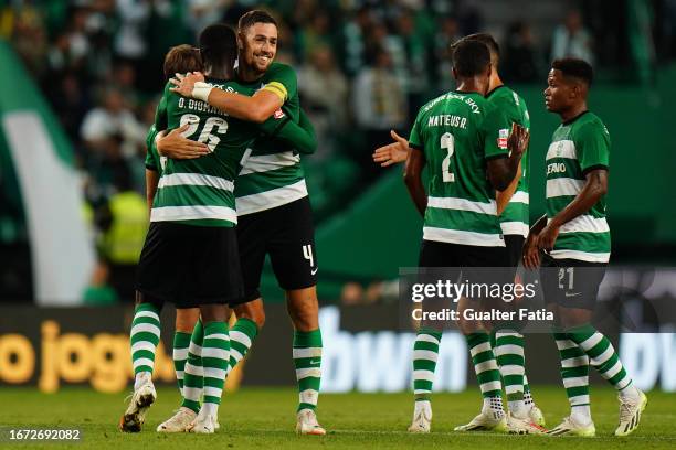 Ousmane Diomande of Sporting CP celebrates the victory with teammate Sebastian Coates of Sporting CP at the end of the Liga Portugal Bwin match...