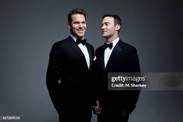 Daytime anchor, Thomas Roberts and husband an HIV community liaison for pharmaceutical company Merck, Patrick Abner are photographed for Out Magazine...