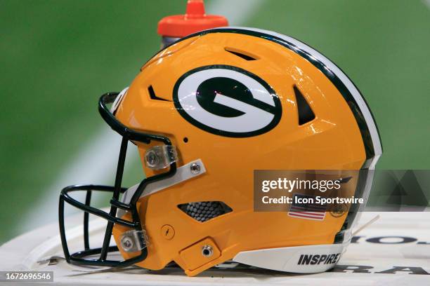 The Green Bay helmet sits on the field during the NFL game between the Green Bay Packers and the Atlanta Falcons on September 17, 2023 at...