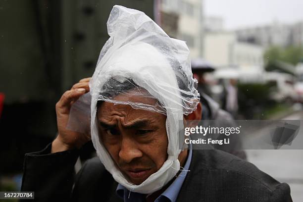 An earthquake survivor leaves the hospital on April 23, 2013 in Lushan of Ya An, China. A magnitude 7 earthquake hit China's Sichuan province on...