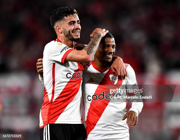 Nicolas De La Cruz of River Plate celebrates with teammate Santiago Simon after scoring the team's second goal during a match between River Plate and...