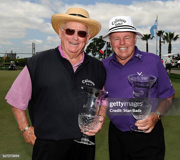 Bob Murphy and Jim Colbert pose with their trophies after defeating Larry Ziegler and Frank Beard in a one-hole playoff during the final round of the...
