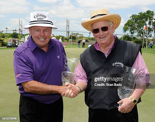 Jim Colbert and Bob Murphy pose with their trophies after defeating Larry Ziegler and Frank Beard in a one-hole playoff during the final round of the...