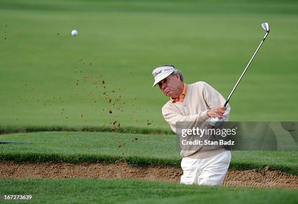 Dale Douglass hits from a bunker on the first hole during the final round of the Demaret Division at the Liberty Mutual Insurance Legends of Golf at...
