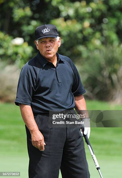 Lee Trevino reacts to his putt on the 16th green during the final round of the Demaret Division at the Liberty Mutual Insurance Legends of Golf at...