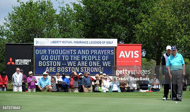 Leader board on the 18th hole displays "We Are One, We Are Boston Strong" during the final round of the Demaret Division at the Liberty Mutual...