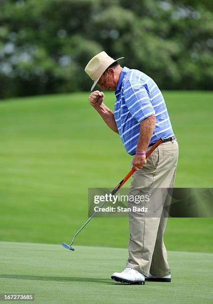 Larry Ziegler reacts to his birdie putt on the 16th hole during the final round of the Demaret Division at the Liberty Mutual Insurance Legends of...