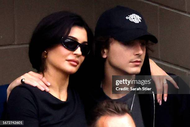 Kylie Jenner and actor Timothée Chalamet look on during the Men's Singles Final match between Novak Djokovic of Serbia and Daniil Medvedev of Russia...