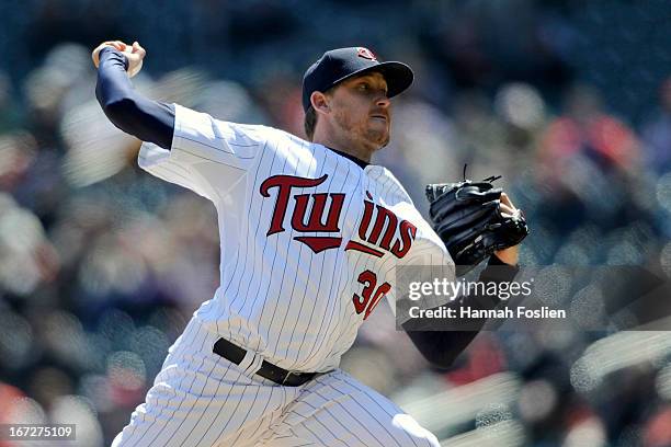 Kevin Correia of the Minnesota Twins delivers a pitch during the first inning of the first game of a doubleheader on April 23, 2013 at Target Field...