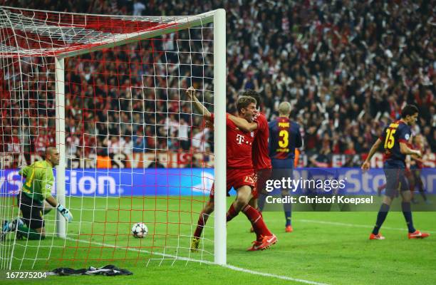 Thomas Mueller of Bayern Muenchen celebrates scoring the opening goal during the UEFA Champions League Semi Final First Leg match between FC Bayern...