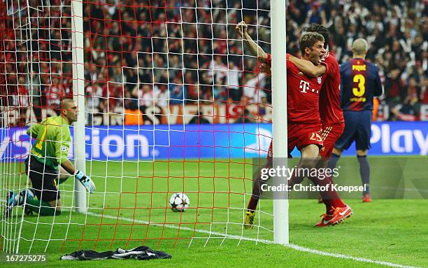 Thomas Mueller of Bayern Muenchen celebrates scoring the opening goal during the UEFA Champions League Semi Final First Leg match between FC Bayern...
