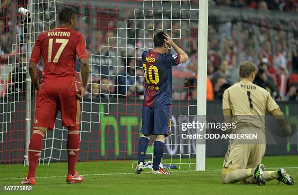 Bayern Munich's defender Jerome Boateng, Barcelona's Argentinian forward Lionel Messi and Bayern Munich's goalkeeper Manuel Neuer react during UEFA...