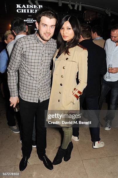 Jack Whitehall and Gemma Chan attend Burberry Live at 121 Regent Street at Burberry on April 23, 2013 in London, England.