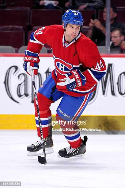 Davis Drewiske of the Montreal Canadiens skates during the warm up period prior to facing the Winnipeg Jets in their NHL game at the Bell Centre on...