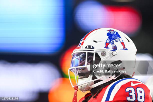 Rhamondre Stevenson of the New England Patriots looks on during warmups prior to the start of the game against the Miami Dolphins at Gillette Stadium...
