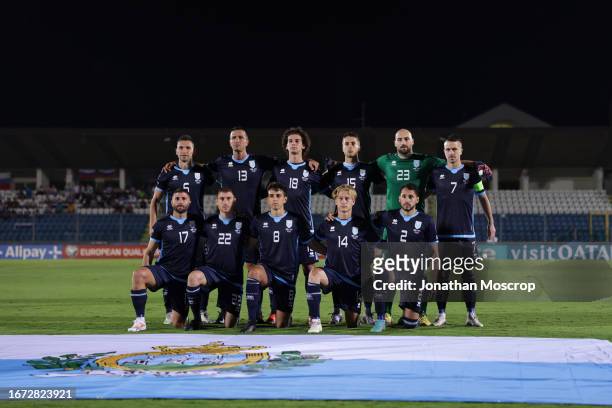 The San Marino starting eleven line up for a team photo prior to kick off, back row ; Dante Rossi, Roberto Di Maio, Simone Franciosi, Alessandro...