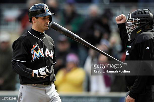 Nick Green of the Miami Marlins reacts as he strikes out for the final out of the first game of a doubleheader against the Minnesota Twins on April...
