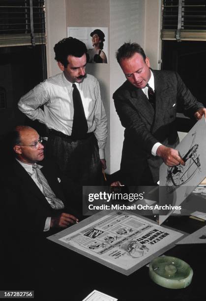 Madison Avenue advertising executives work on a project circa 1950 in New York City, New York.