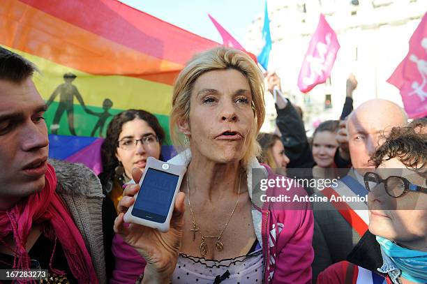 Supporters and anti-same sex marriage activist Frigide Barjot of the anti-gay marriage movement 'la Manif pour Tous' protest during a demonstration,...