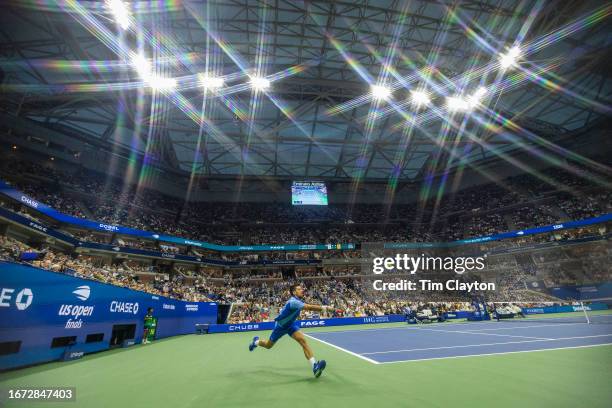 September 10: A general view as Novak Djokovic of Serbia stretches to reach a serve from Daniil Medvedev of Russia in the Men's Singles Final on a...