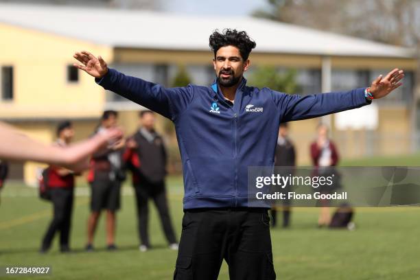 Black Cap Ish Sodhi plays backyard cricket with students at his high school after the New Zealand ICC Men's Cricket World Cup Squad Announcement at...