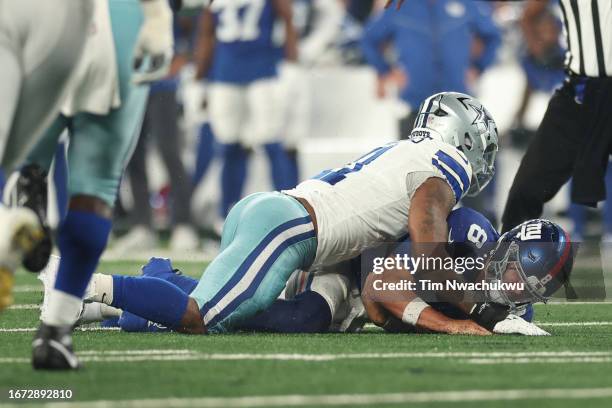Micah Parsons of the Dallas Cowboys sacks Daniel Jones of the New York Giants during the first quarter at MetLife Stadium on September 10, 2023 in...
